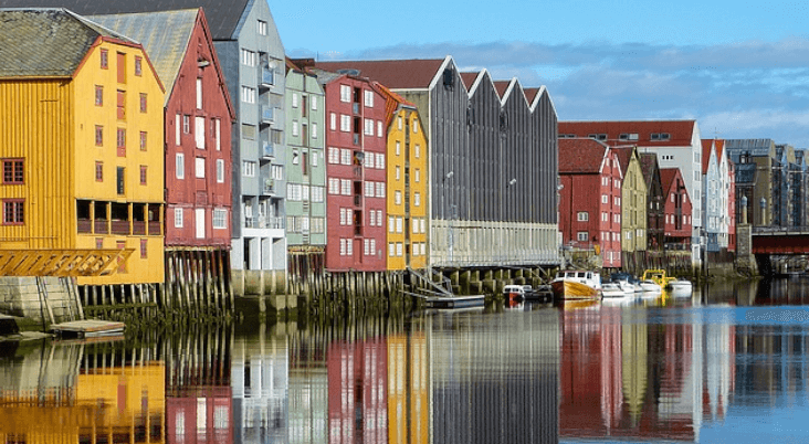 A row of colorful houses on water